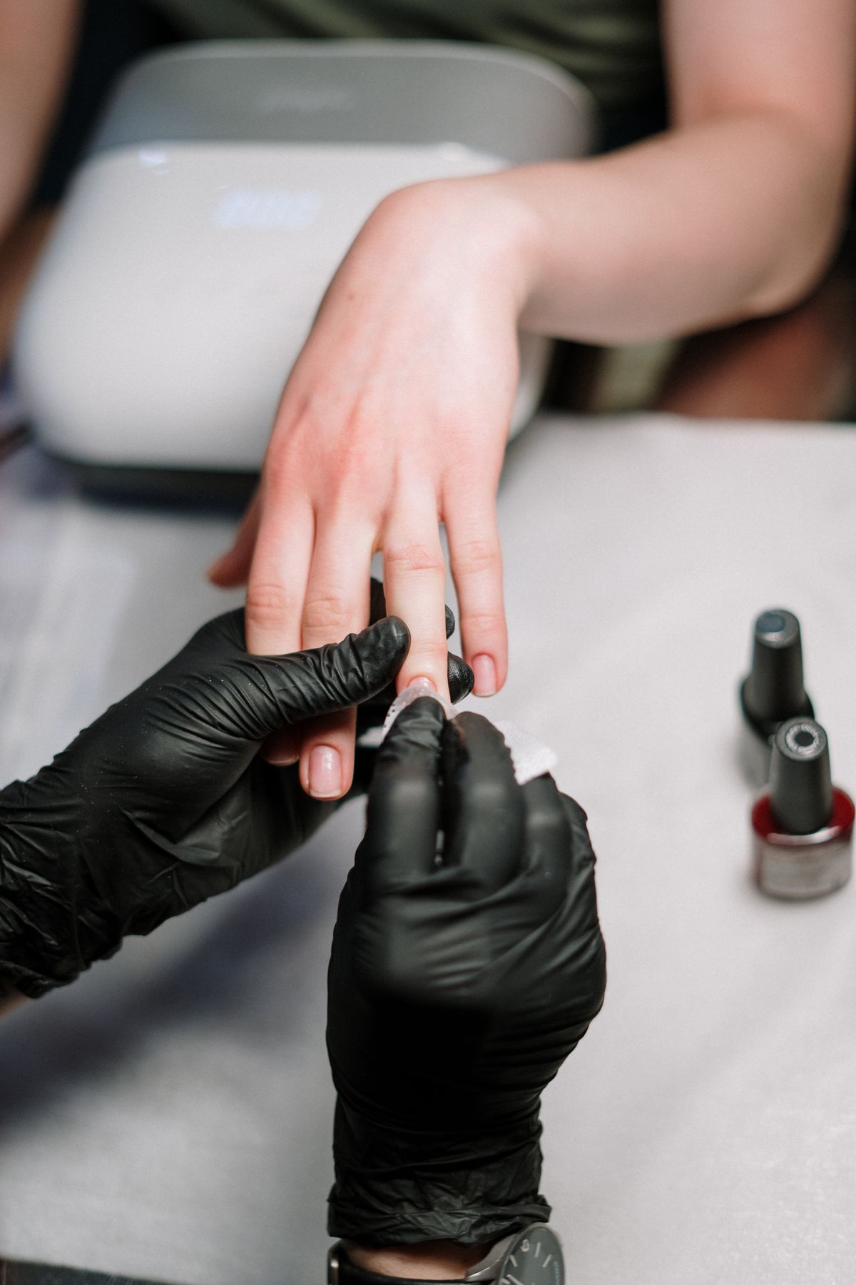 Gel manicure application at a nail spa